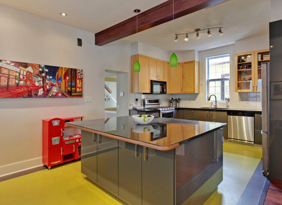 Removed small office room, replaced all flooring, lower cabinets and built new island.